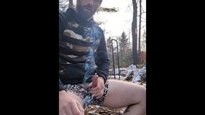 Lumberjack cum-shot outdoors