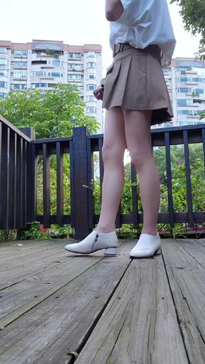 Shemale Ting Xuan Masturbates Outdoor and Ejaculates on Her Legs.