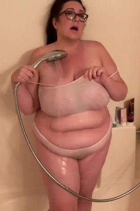 Busty BBW babe gets soaked in the shower