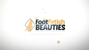 Topless belle shows off her perfect feet and hands while painting a