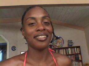 Horny ebony sits on a big white dick and fucks it hard with her pussy