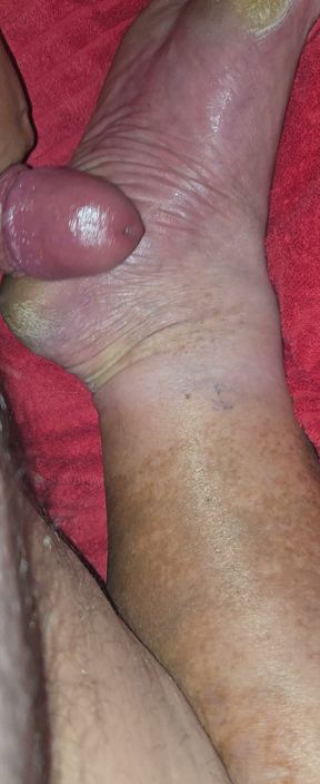 Smacking my hard cock with my feet