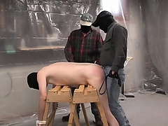 Rednecks tie down a chubby dude and give him a rough spanking