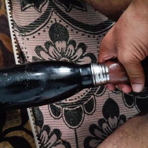 Indian boy fucks water bottle