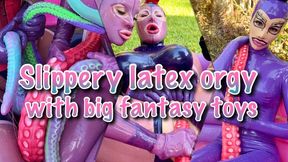 Slippery latex orgy with big fantasy toys