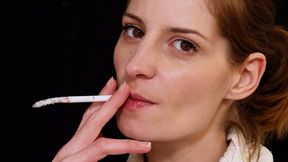 Eve is smoking a 120's cigarette seductively close-up best of"