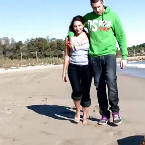 A hot German girl getting her holes stretched on the public beach