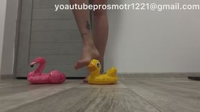 Nastya tramples on inflatable toys with her bare feet, steps on them with her weight, crushes and destroys them; there are only a few left. Crush fetish Foot fetish Bare feet