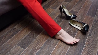 Naked feet in mistress shoes puts on nylon socks