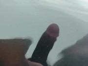 Thick black dick jerks off under water