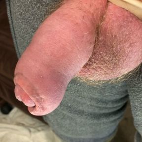 Up close cock and balls.  Uncut veiny dick.