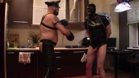 In boxing gloves, I hit a slave in latex hard in the face, chest and balls and knocked him out