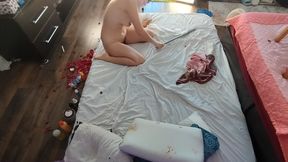 Sensual massage of a hot couple with oil on the body. Foreplay in the bedroom with an amateur couple.