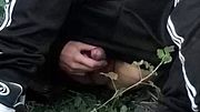Cute Asian gay twink in a black-and-white adidas tracksuit and Campus sneakers masturbates and cums outdoors