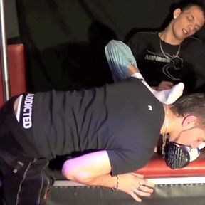 Slut submimssed by sneakers and feet in backroom