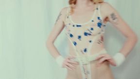 A 6-foot-tall lingerie model demonstrates aerobic exercises