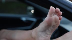 Resting Feet out of the Car Window