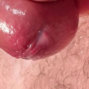 Close-up testicles massaging until big cumshot