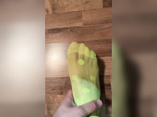 Enjoying in new neon dotted green socks