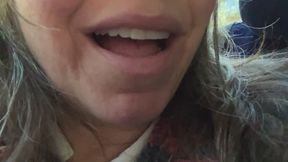 Sucking and chewing sweet tarts with a smile and a moan