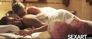 Watch horny lesbian beauties get oiled up for a naked massage