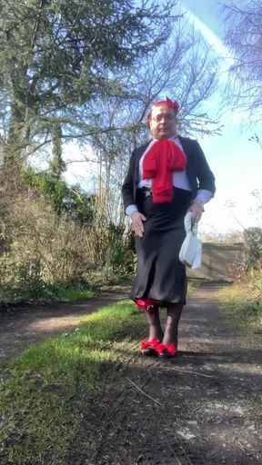 Dressed with a black skirt with a full-length slit for a night out