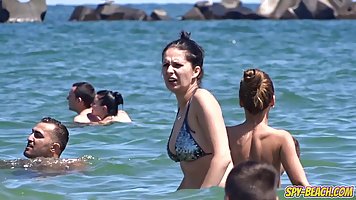 Lovely amateur girls are topless at the beach and enjoying every single second of it