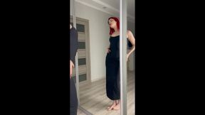 Fiery Beauty in a Black Dress Seduces at the Mirror