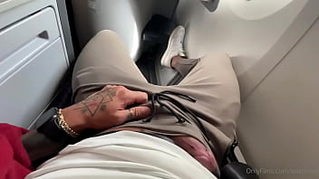 Touching his dick on a plane