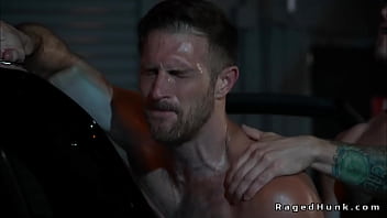 Gay driver anal fucks client in a trunk in an abandoned garage