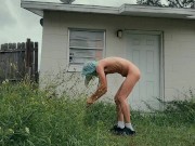 twink trimming the grass naked outside