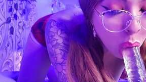 University Whore with glasses is sucking a transparent dildo. 2