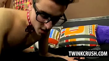 Twink wearing glasses gets fucked in his ass bareback