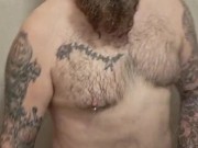 Chubby Scottish Bear in the shower.