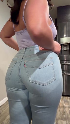 Curvy blonde in blue jeans