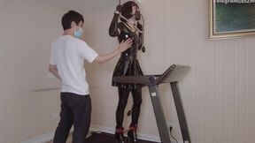 Mz24 - a Girl Bound to a Treadmill with Metal Restraints and Shackles