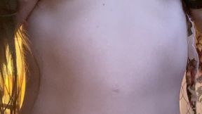 Solo amateur in sheer top and thong plays with her boobs