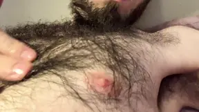 Dripping oil over and playing with my very hairy chest and nipples