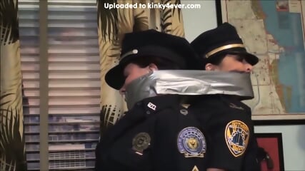 Two Cops Cuffed And Duct Taped