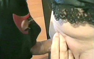 Mature crossdresser sucking a pecker