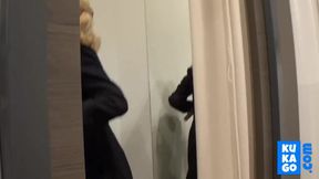 Big-Titted Blonde Fingers Herself in a Public Changing Room