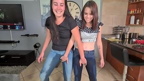 Two amateur girls get soaked in urine, causing their jeans to become drenched