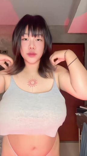 Curvy solo babe shows off her big tits