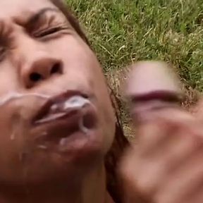 Black slut gets oiled up by her Latino lover and they fuck outdoors