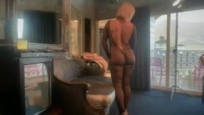 Ryan Keely BTS video on a couch in a body stocking