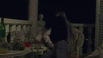 Aroused lesbians started making out on the balcony and soon they were eating each other up