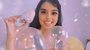 baloes com confetes na cabeça