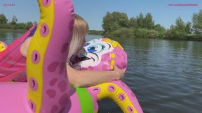 I float on an inflatable octopus in the lake and inflate its head with my mouth