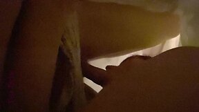 Receiving oral pleasure under the covers