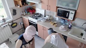 Hot amateur couple having fun in the kitchen.